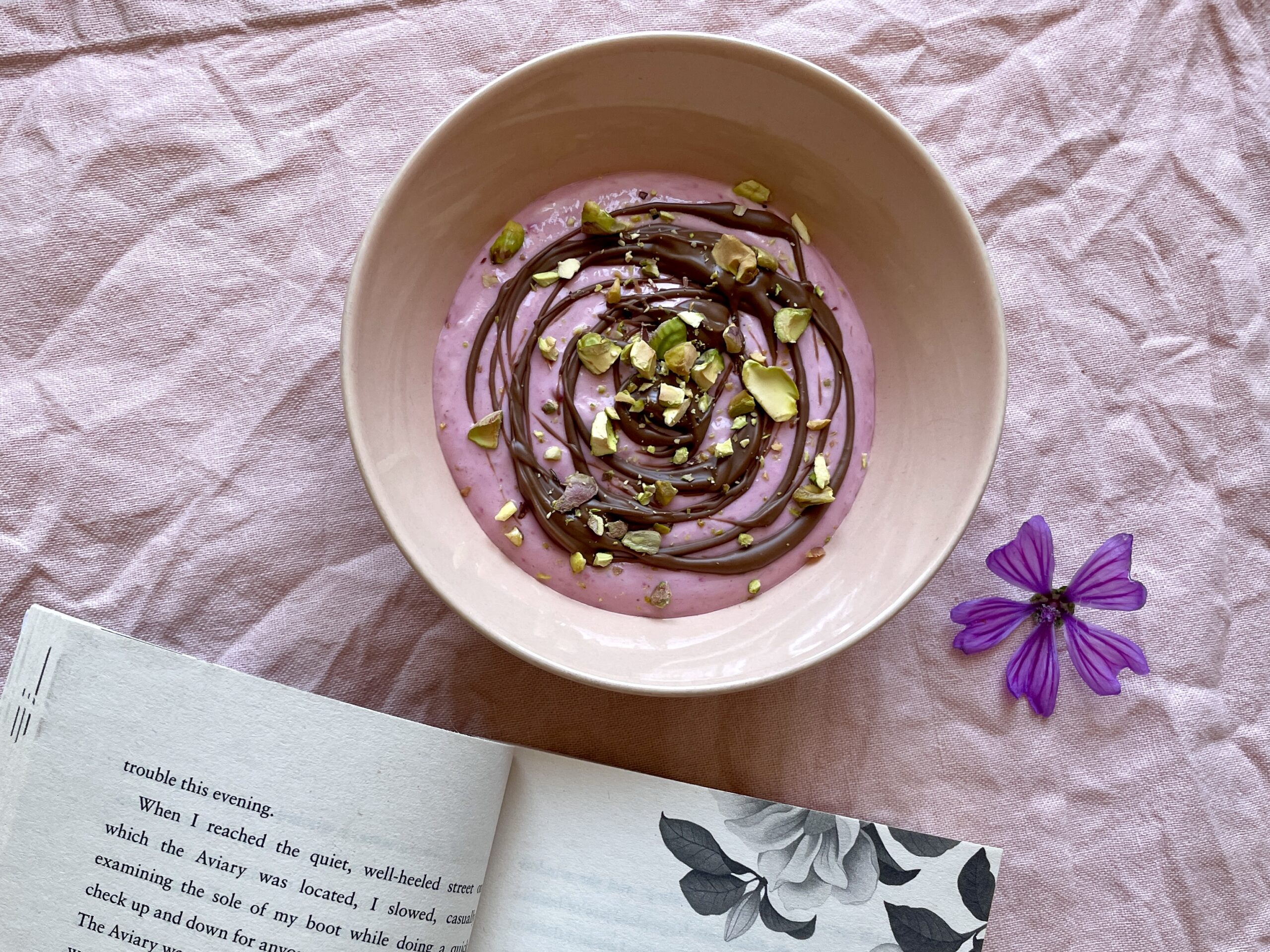 High Protein Raspberry-Banana Bowl with Melted Nougat and Pistachios